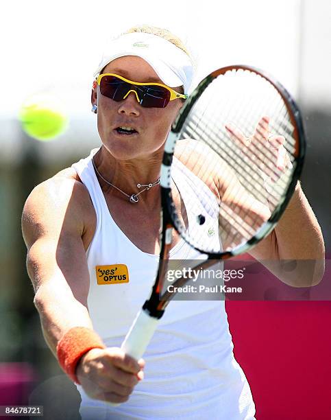 Samantha Stosur of Australia plays a return shot to Marina Erakovic of New Zealand during day four of the Fed Cup Asia/Oceania Zone Group 1 & 2 match...