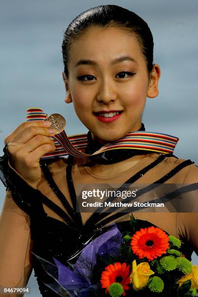 Mao Asada of Japan poses for photographers after the Ladies Free Skate during the ISU Four Continents Figure Skating Championships at Pacific...