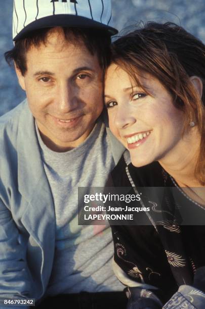 Close up Paul Simon et Carrie Fisher le 20 septembre 1983 en France.