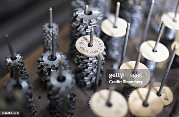 Salvaged vintage watchmaking components sit in an attic store at the Zenith, a watchmaking unit of LVMH Moet Hennessy Louis Vuitton SA , production...