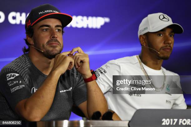 Fernando Alonso of Spain and McLaren Honda and Lewis Hamilton of Great Britain and Mercedes GP in the Drivers Press Conference during previews ahead...