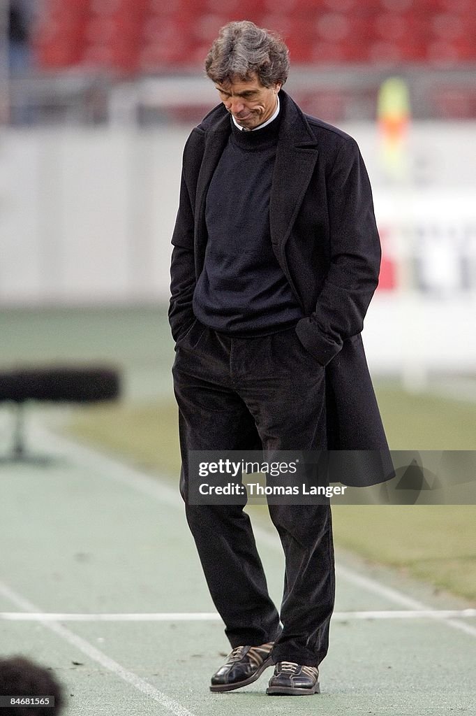 Coach Rainer Adrion of Stuttgart looks dejected after the 03 goal