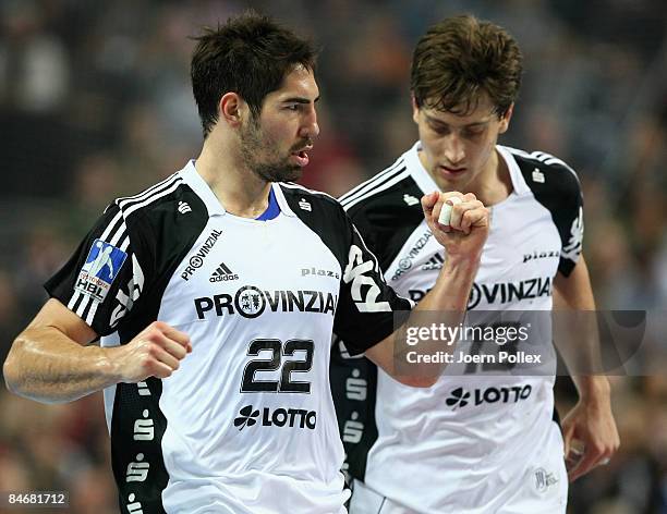 Nikola Karabatic and Marcus Ahlm of Kiel celebrate during the Handball Bundesliga match between THW Kiel and HBW Balingen-Weilstetten at the...