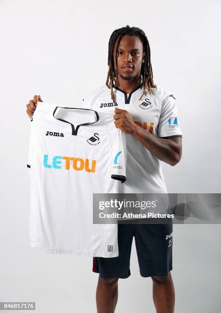 New signing Renato Sanches poses with a home shirt prior to the Swansea City Training at The Fairwood Training Ground on September 08, 2017 in...