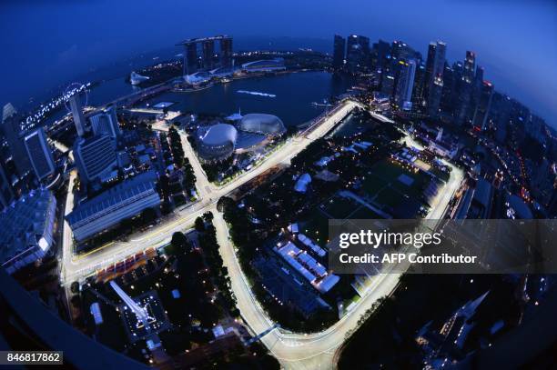 General view taken from Swissotel the Stamford shows the illuminated circuit for the upcoming Formula One Singapore Grand Prix night race on...