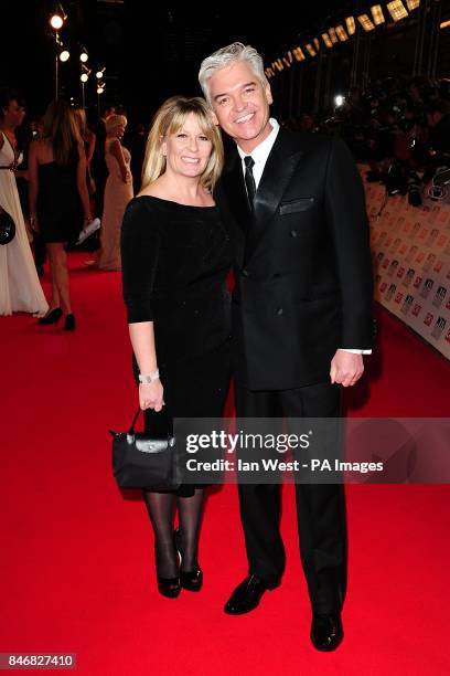 Phillip Schofield and wife Stephanie Lowe arriving for the 2012 NTA Awards at the O2, Greenwich, London