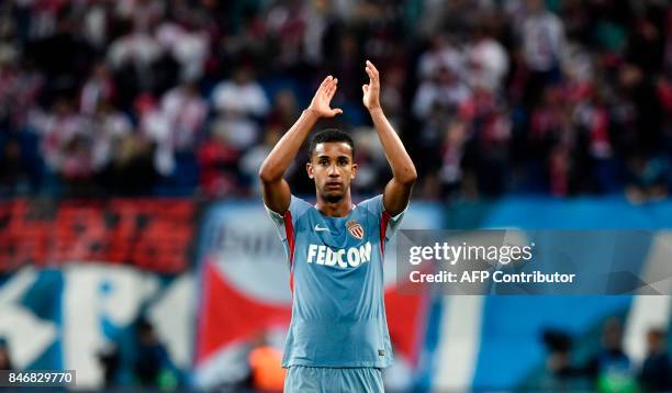 Monaco's Brazilian defender Jorge applauds their supporters after the UEFA Champions League group G football match RB Leipzig v AS Monaco in Leipzig,...