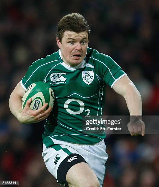 Brian O'Driscoll of Ireland breaks clear to score his team's second try during the RBS 6 Nations Championship match between Ireland and France at...