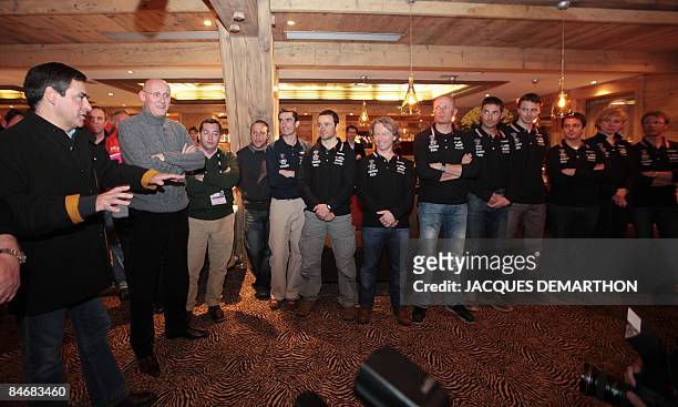 French Prime Minister Francois Fillon and French Secretary of State for Sport Bernard Laporte pose with the French ski team at the World Ski...