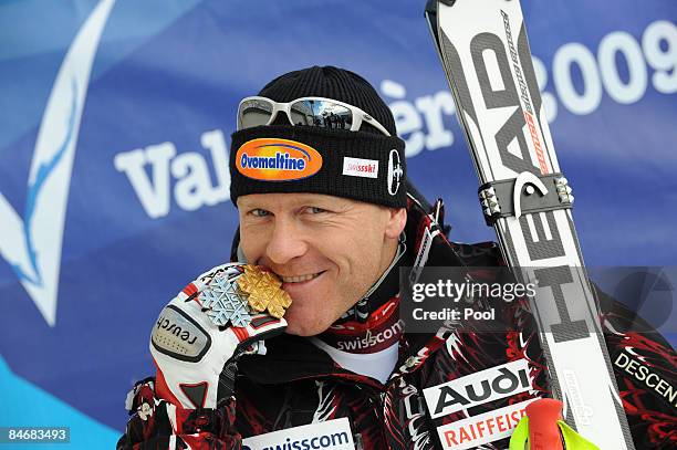 Didier Cuche of Switzerland celebrates with his Silver Medal after skiing to second place in the Men's Downhill event held on the Face de Bellevarde...