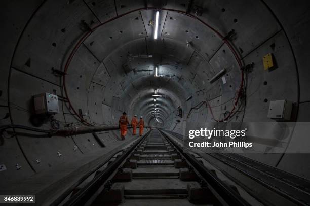 Crossrail engineers inspect the completed track as the Crossrail project celebrates the completion of the Elizabeth line track, on September 14, 2017...