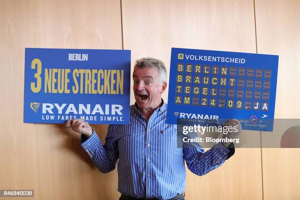 Michael O'Leary, chief executive officer of Ryanair Holdings Plc, poses for photographers ahead of a news conference at Tegel airport in Berlin,...