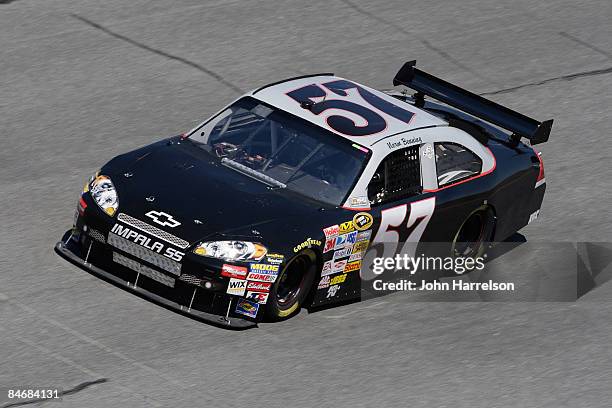 Norm Benning driver of the Chevrolet during practice for the NASCAR Sprint Cup Series Daytona 500 at Daytona International Speedway on February 7,...