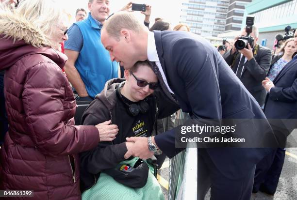 Prince William, Duke of Cambridge hugs Katie Daley during a visit to Aintree University Hospital on September 14, 2017 in Liverpool, England. The...