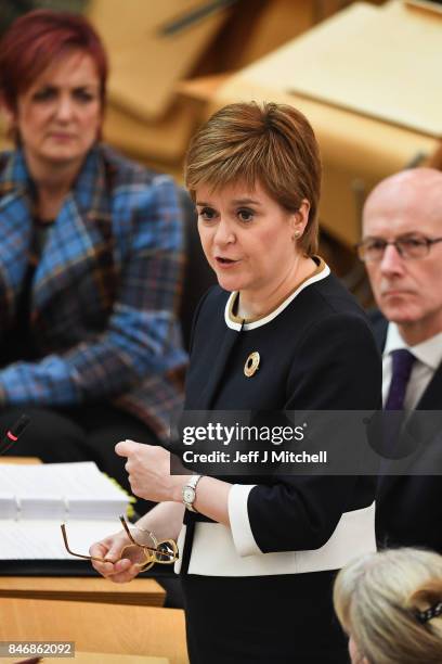 First Minister of Scotland Nicola Sturgeon answers questions during first ministers questions in the Scottish Parliament on September 14, 2017 in...