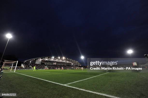 General view of match action under floodlights between Blackpool and Fleetwood Town