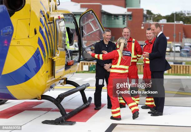 Prince William, Duke of Cambridge meets air ambulance staff during a visit to Aintree University Hospital on September 14, 2017 in Liverpool,...
