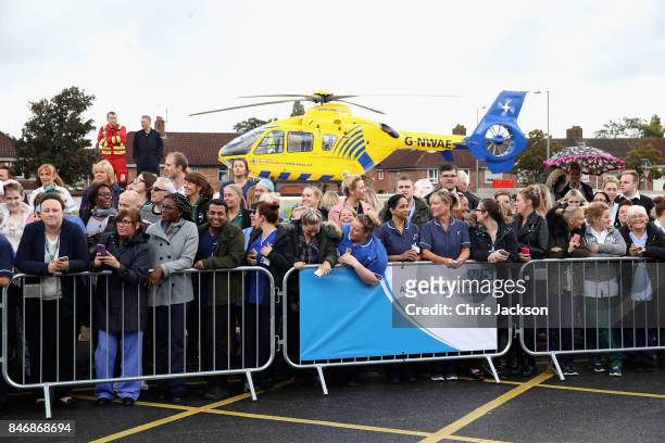 Hospital staff gather to meet Prince William, Duke of Cambridge during a visit to Aintree University Hospital on September 14, 2017 in Liverpool,...