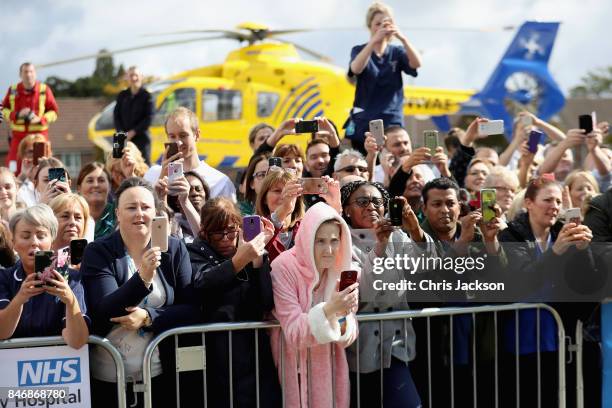 Hospital staff and patients gather to meet Prince William, Duke of Cambridge during a visit to Aintree University Hospital on September 14, 2017 in...