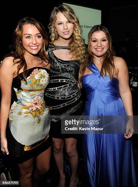 Miley Cyrus, Taylor Swift and Kelly Clarkson attends the 2009 GRAMMY Salute To Industry Icons honoring Clive Davis at the Beverly Hilton Hotel on...