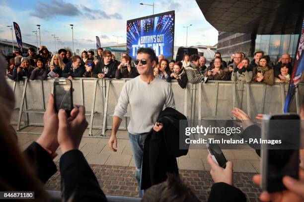 Simon Cowell arrives to meet fans outside the Millennium Centre in Cardiff for the filming of Britain's Got Talent auditions.