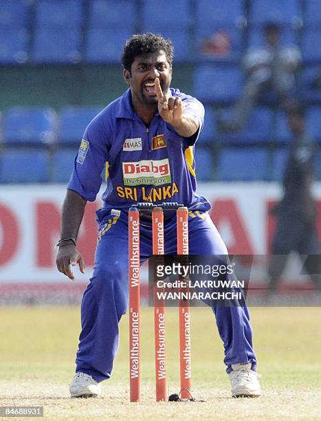 Sri Lankan cricketer Muttiah Muralitharan successfully appeals for a Leg Before Wicket decision against Indian cricketer Yusuf Pathan during fifth...