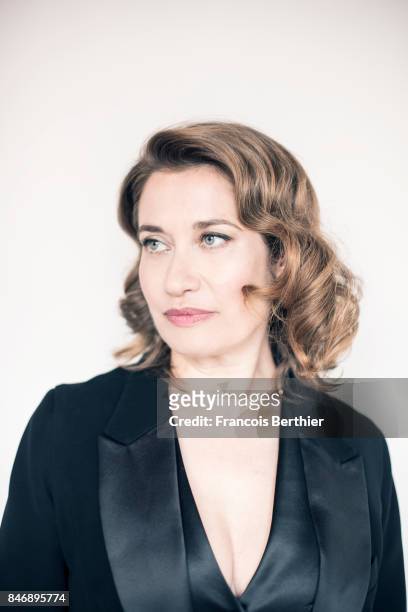 Actress Emmanuelle Devos is photographed on September 9, 2017 in Deauville, France.