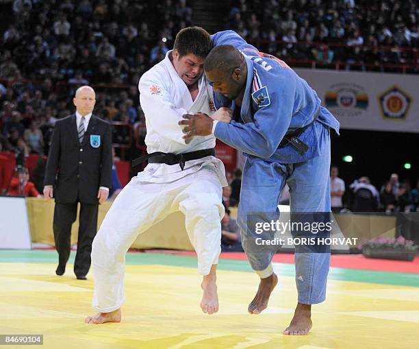 France's Teddy Riner battles with Hungria's Barna Bor on February 8, 2009 during their men preliminary round in the +100 kg category on February 8,...