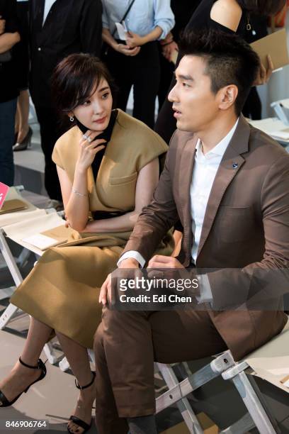 Yang Mi & Mark Zhao attend the Michael Kors runway show during New York Fashion Week at Spring Studios on September 13, 2017 in New York City.
