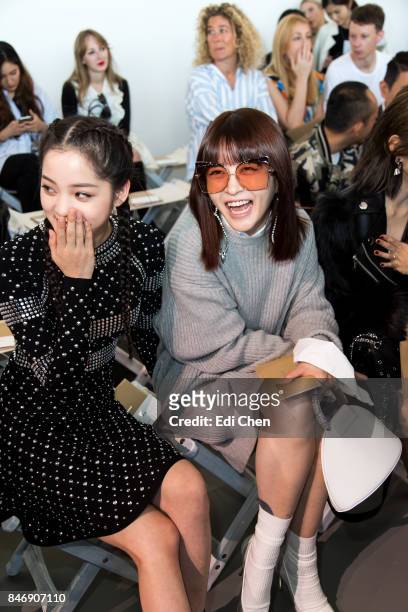 Oyang Nana & Fil Xiaobai attend the Michael Kors runway show during New York Fashion Week at Spring Studios on September 13, 2017 in New York City.