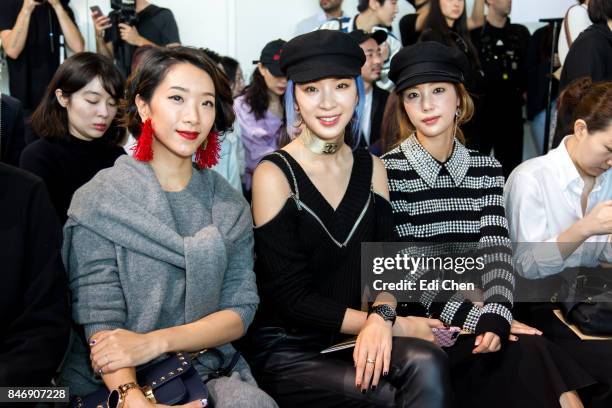 Veronica Li, Irene Kim & Ki Eun-Se attend the Michael Kors runway show during New York Fashion Week at Spring Studios on September 13, 2017 in New...