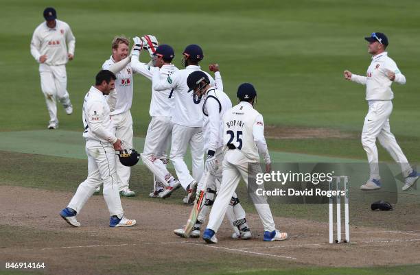 Simom Harmer of Essex celebrates with team mates after taking the Warwickshsire final wicket of Henry Brookes during their victory in the Specsavers...