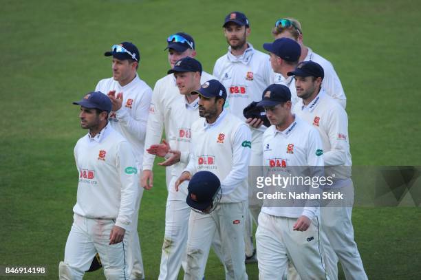 Essex players walk off the pitch after winning the County Championship Division One match between Warwickshire and Essex at Edgbaston on September...