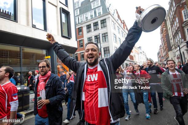 Cologne football fans parade through Soho ahead of the FC Koln match against Arsenal this evening on September 14, 2017 in London, England. Arsenal...
