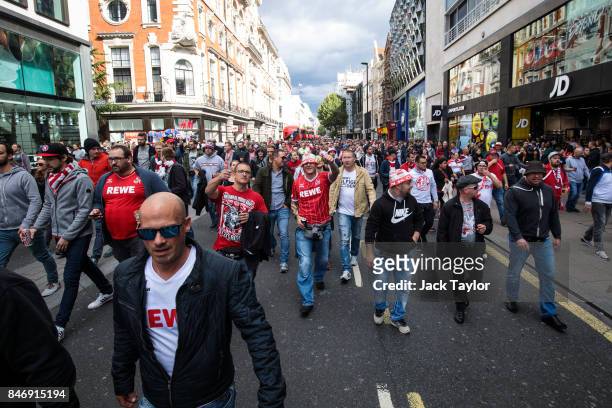 Cologne football fans parade along Oxford Street ahead of the FC Koln match against Arsenal this evening on September 14, 2017 in London, England....