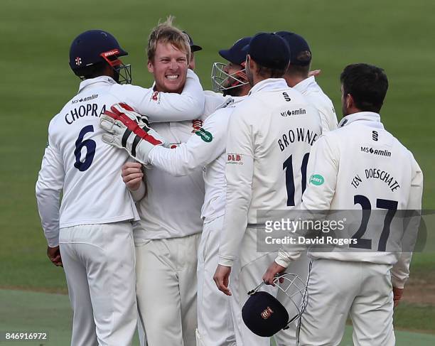 Simom Harmer of Essex celebrates with team mates after taking the final Warwckshire wicket of Henry Brookes during the victory in the Specsavers...