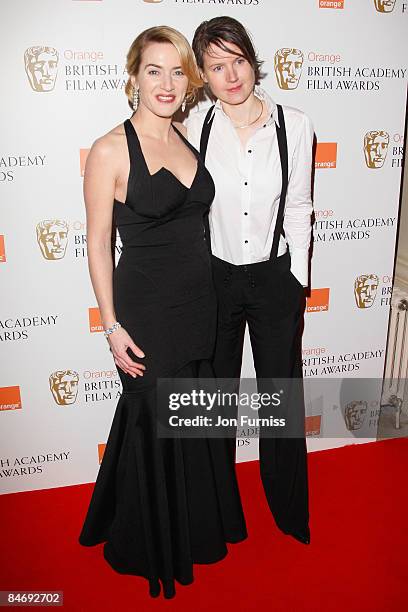 Kate Winslet and guest arrive at The Orange British Academy Film Awards held at the Royal Opera House on February 8, 2009 in London, England.