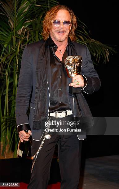 Best Actor Mickey Rourke poses at the winner's board at The Orange British Academy Film Awards held at the Royal Opera House on February 8, 2009 in...
