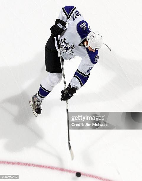 Kyle Quincey of the Los Angeles Kings warms up before playing against the New Jersey Devils at the Prudential Center on February 7, 2009 in Newark,...