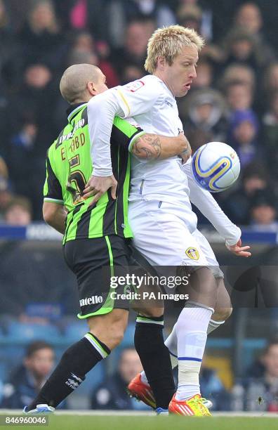 Leeds United's Luciano Becchio and Brighton & Hove Albion's Adam El-Abd battle for the ball during the npower Football League Championship match at...