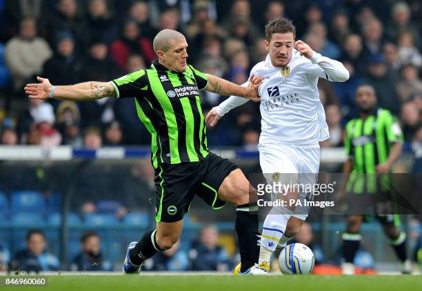 Leeds United's Ross McCormack and Brighton & Hove Albion's Adam El-Abd battle for the ball during the npower Football League Championship match at...