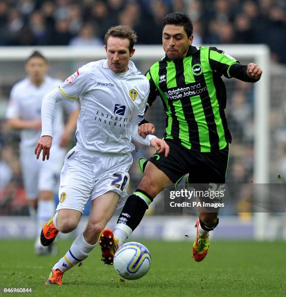 Leeds United's Aidan White and Brighton & Hove Albion's Gonzalo Jara battle for the ball during the npower Football League Championship match at...