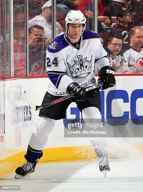 Alexander Frolov of the Los Angeles Kings skates against the New Jersey Devils at the Prudential Center on February 7, 2009 in Newark, New Jersey.The...