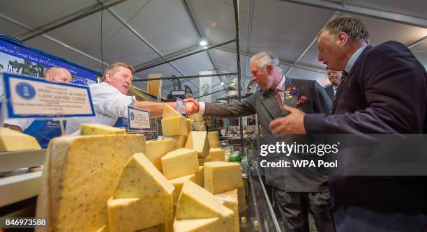 Prince Charles, Prince of Wales meets the stall holders Lancashire Cheese Company as he visits The Westmorland County Show on September 14, 2017 in...