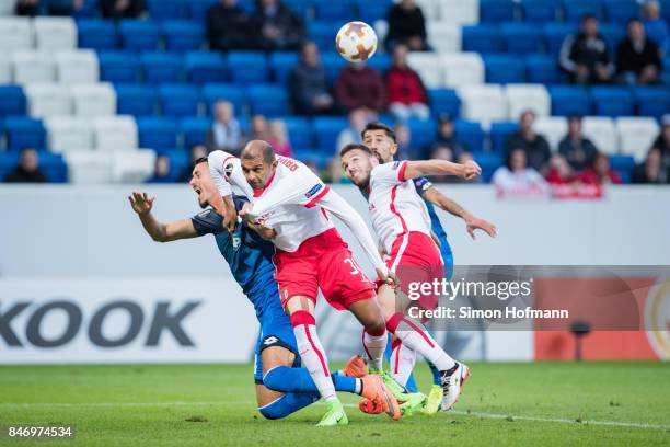 Sandro Wagner of Hoffenheim is tackled by Raul Silva of Braga during the UEFA Europa League Group C match between 1899 Hoffenheim and Sporting Braga...