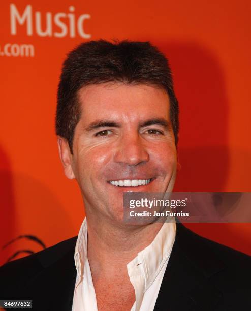 Music executive Simon Cowell arrives at the Music Industry Trusts' Awards held at the Grosvenor House Hotel, Park Lane on November 3, 2008 in London,...