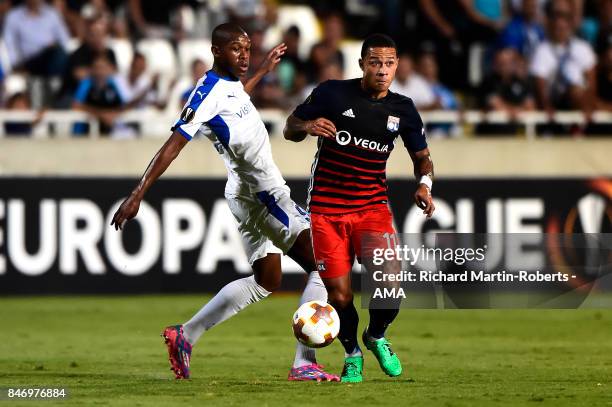 Memphis Depay of Olympique Lyonnais competes with Alef of Apollon Limassol during the UEFA Europa League group E match between Apollon Limassol and...