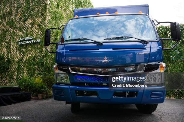 The Mitsubishi Fuso eCanter truck is displayed during a launch event in New York, U.S., on Thursday, Sept. 14, 2017. The Daimler AG unit unveiled the...