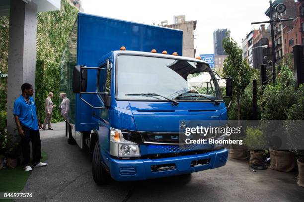 The Mitsubishi Fuso eCanter truck is displayed during a launch event in New York, U.S., on Thursday, Sept. 14, 2017. The Daimler AG unit unveiled the...