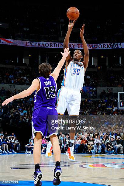 Kevin Durant the Oklahoma City Thunder goes to the basket against Beno Udrih of the Sacramento Kings at the Ford Center on February 8, 2009 in...